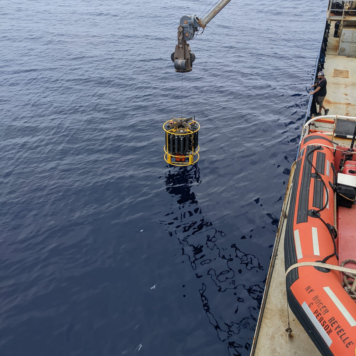 Rosette being deployed into the ocean. Photo by Sophie Shapiro.