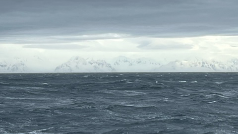 Our last glimpse of the Antarctic Peninsula before heading out into open ocean. Credit: Josie Adams