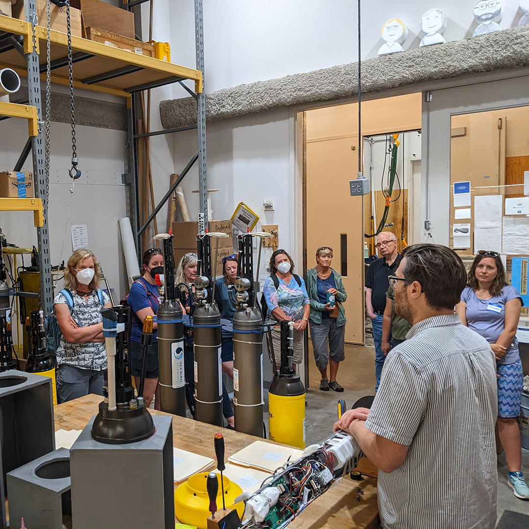 Greg Brusseau gives a tour of the float lab to MBARI EARTH teachers in 2023