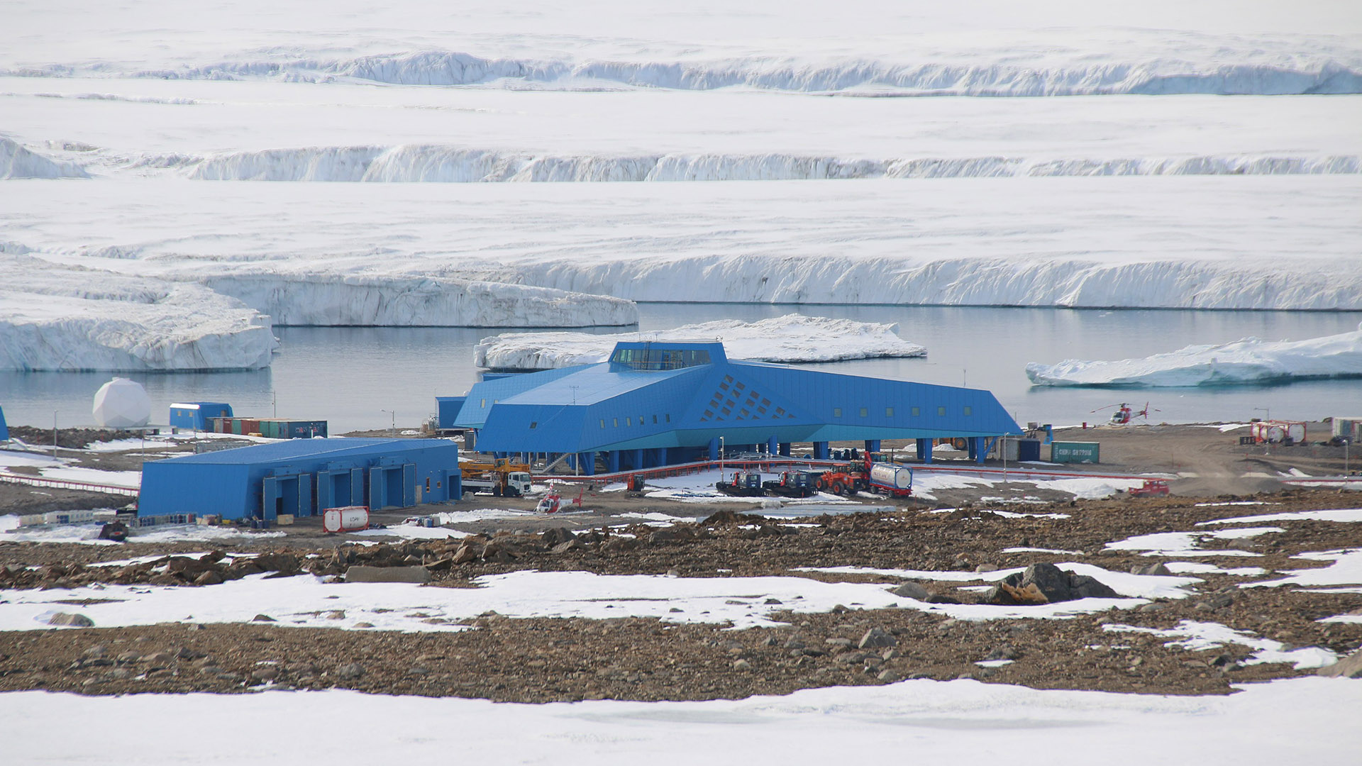 South Korean Jang Bogo Station seen from a ridge south of it in January 2017. Terra Nova Bay, Antarctica; Photo from Wikimedia Commons