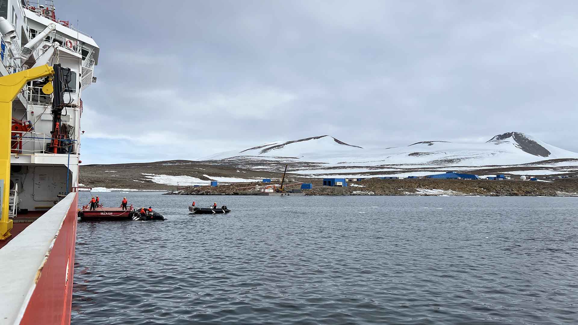 Unloading the cargo from the IBRV Araon using RIBs and a barge