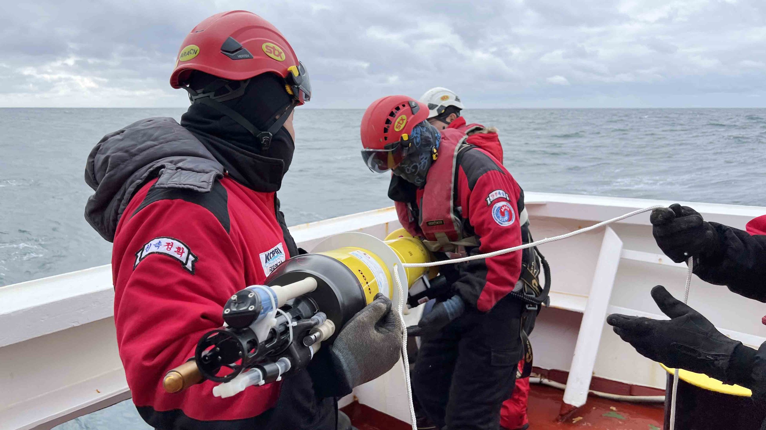 Photo of the crew launching Sir Float a Lot over the side. 