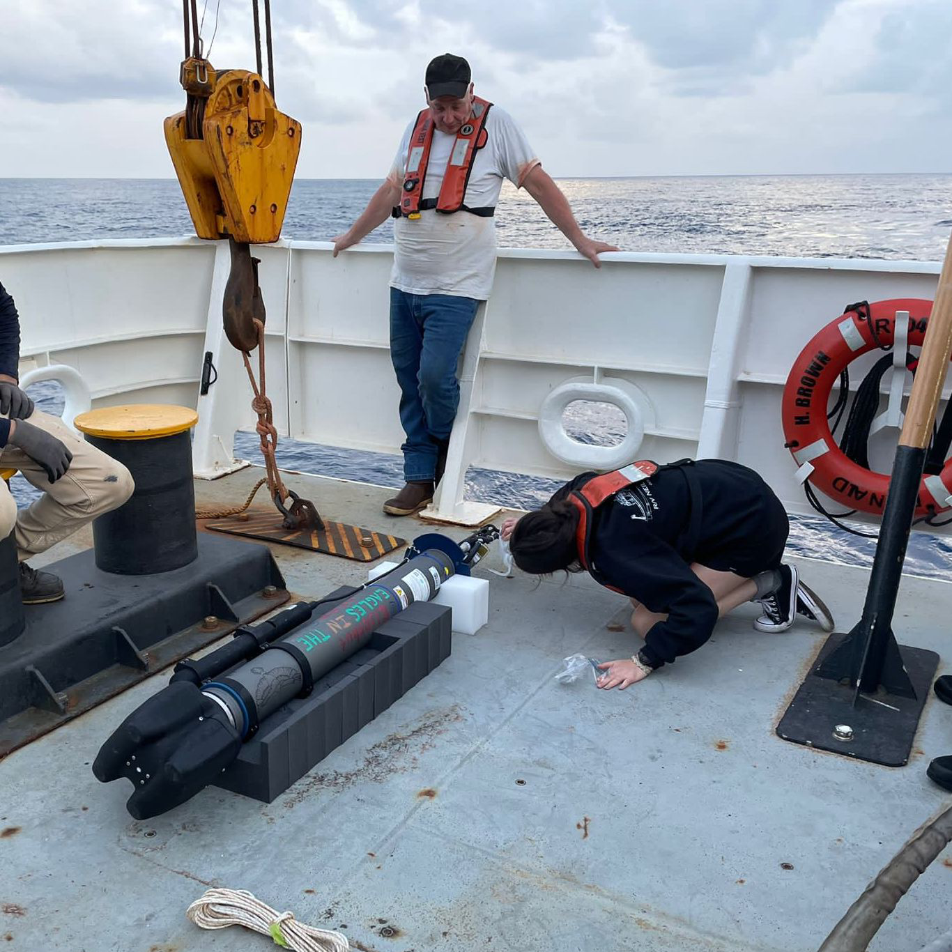 a photo showing the science crew checking the sensors