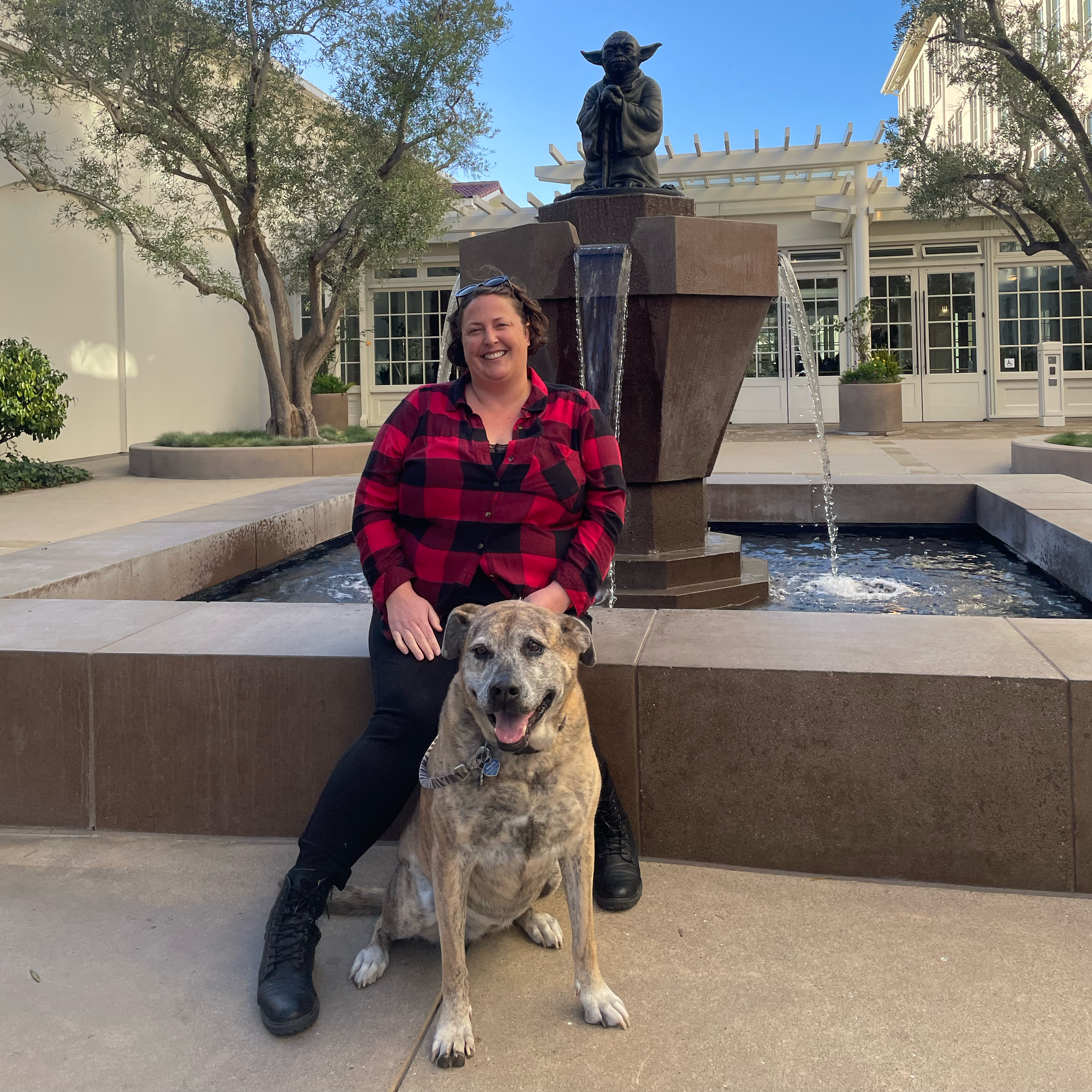 A photo of Melissa with her dog