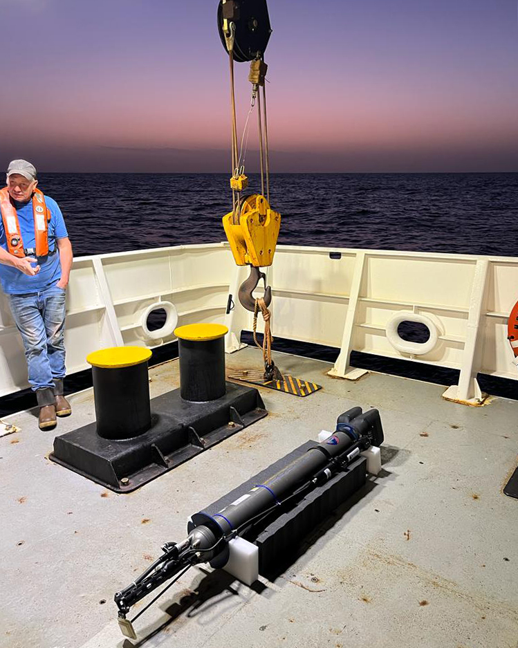 Climate READY Ambassador on deck prior to deployment at dusk. Photo by Tyler Christian.