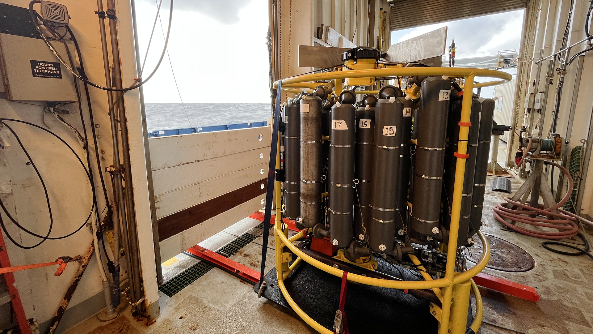 The wooden boards behind the CTD stop waves from coming in during sampling. Photo by Kirstin Petzer.