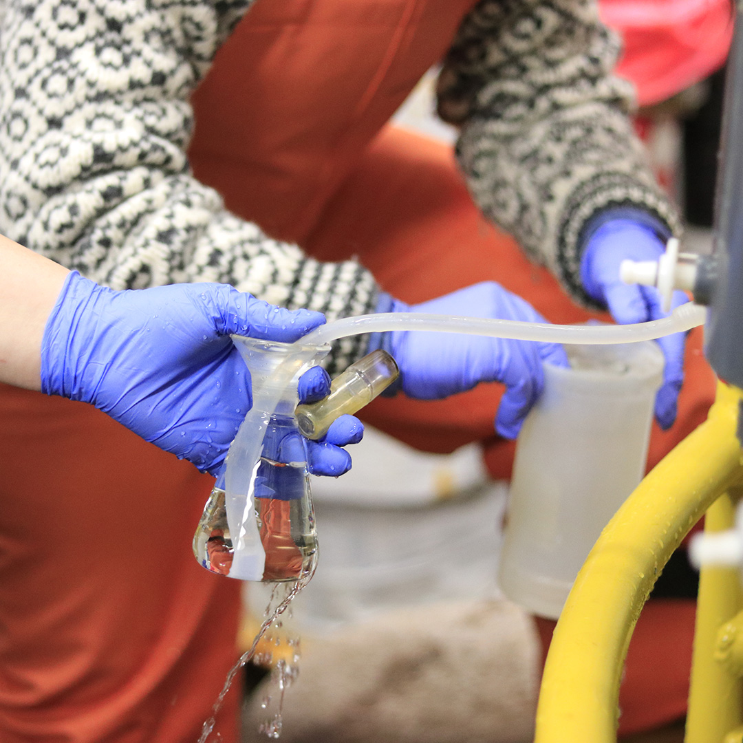 collecting water from the CTD rosette (Photo by J. Magnusson)