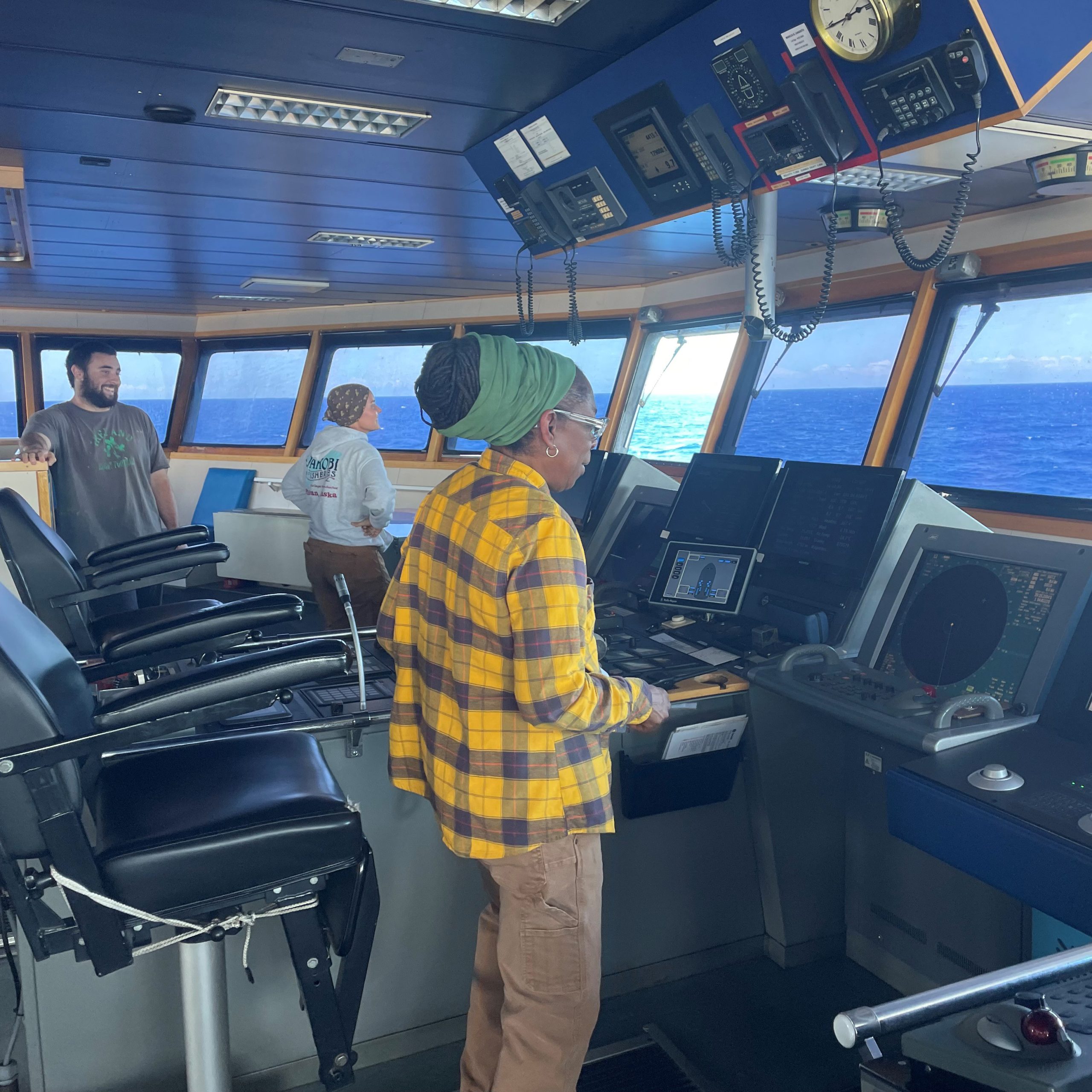 Joselyn White, 2nd Mate, monitoring the Bridge, with Gerry McLamon and Lindsay Daniels, both Able Seamen (AB), standing watch on R/V Marcus G. Langseth.