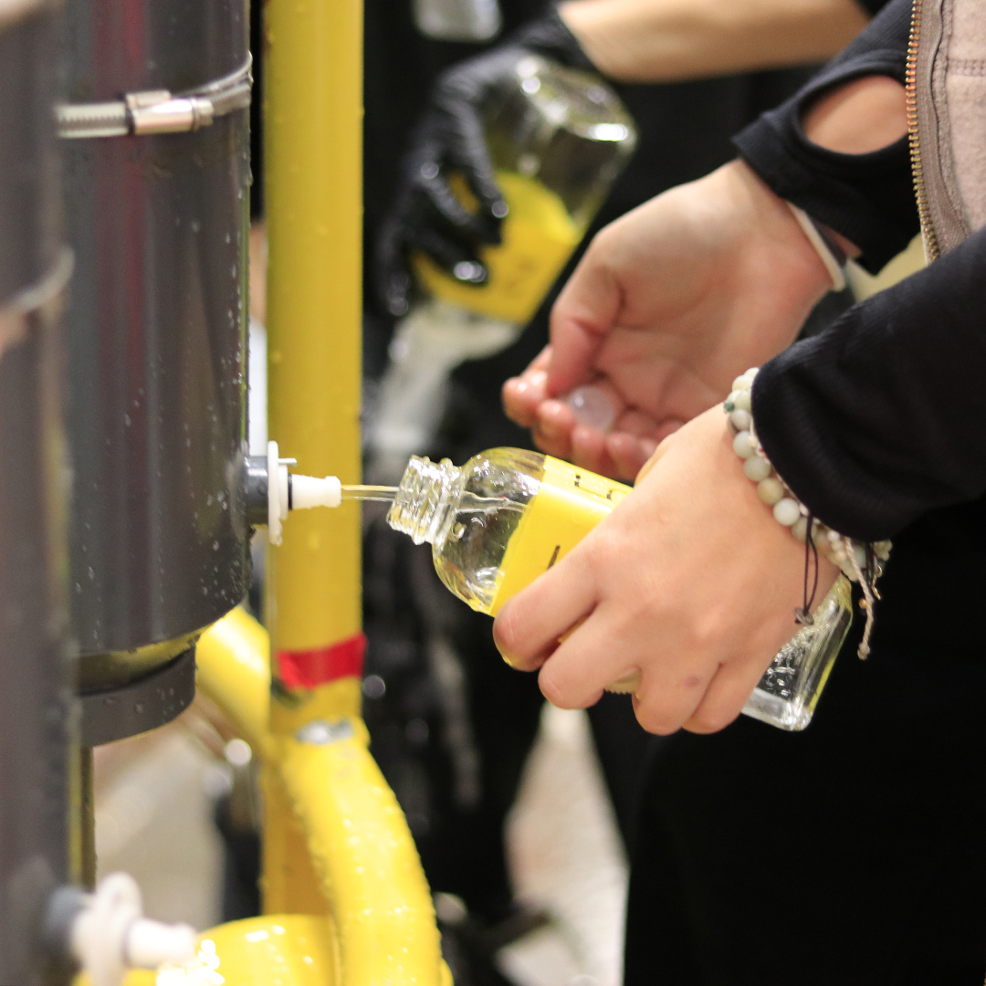 Each of the glass bottles is rinsed 3 times and then filled with seawater from the Niskin.