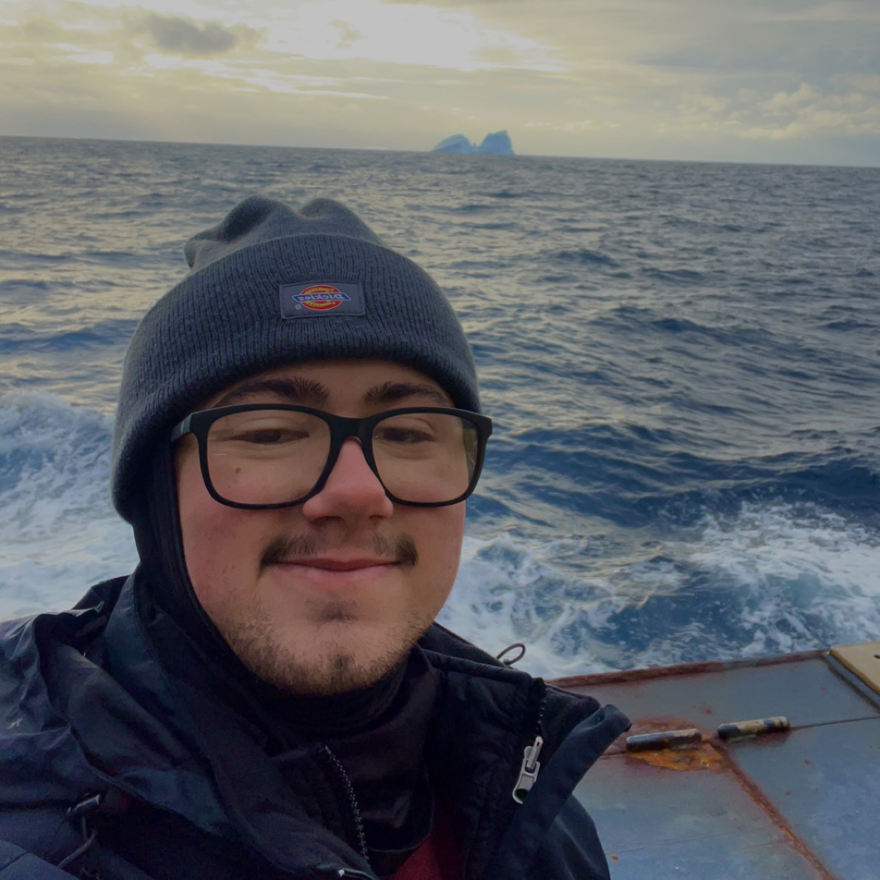 Max Pacatte (UCSB) enjoying the view of Icebergs while sampling.