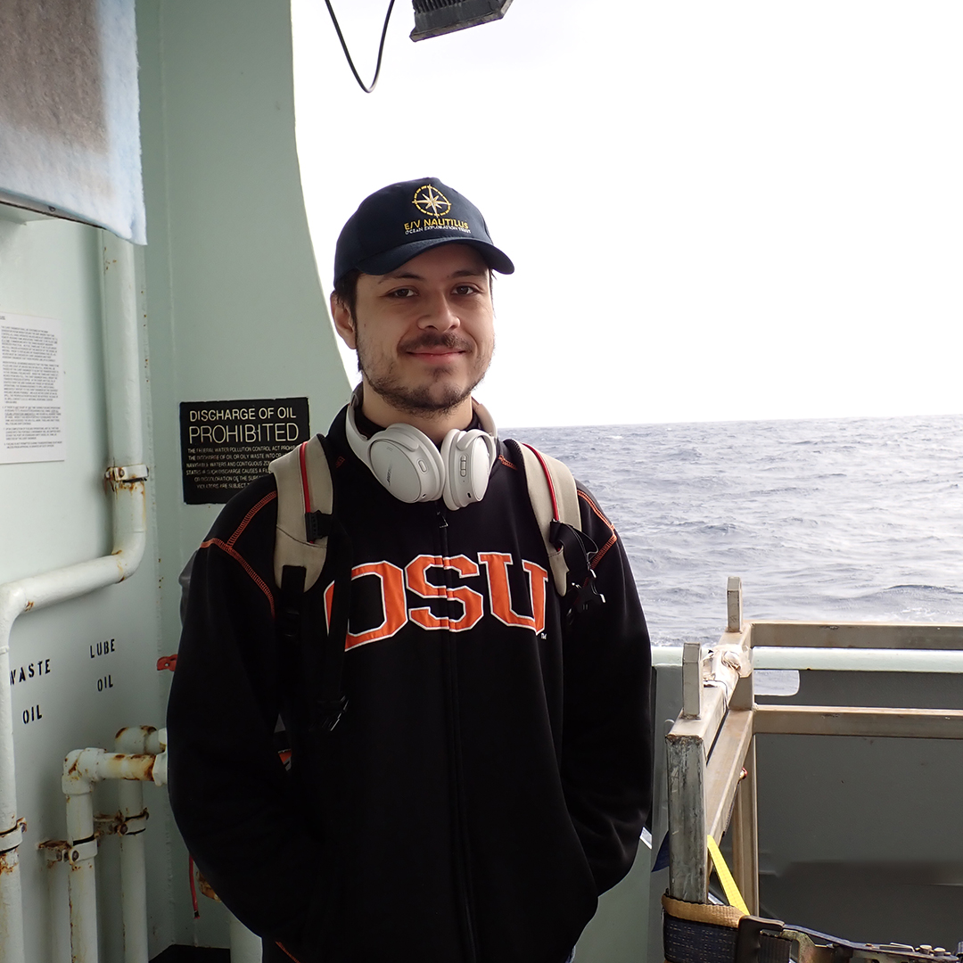 Vincent on the deck of the R/V Thompson. (Photo by J. McLaughlin)</p>
<p>