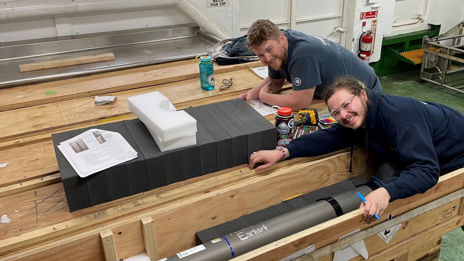 The black Navis floats are decorated with silver and gold sharpies