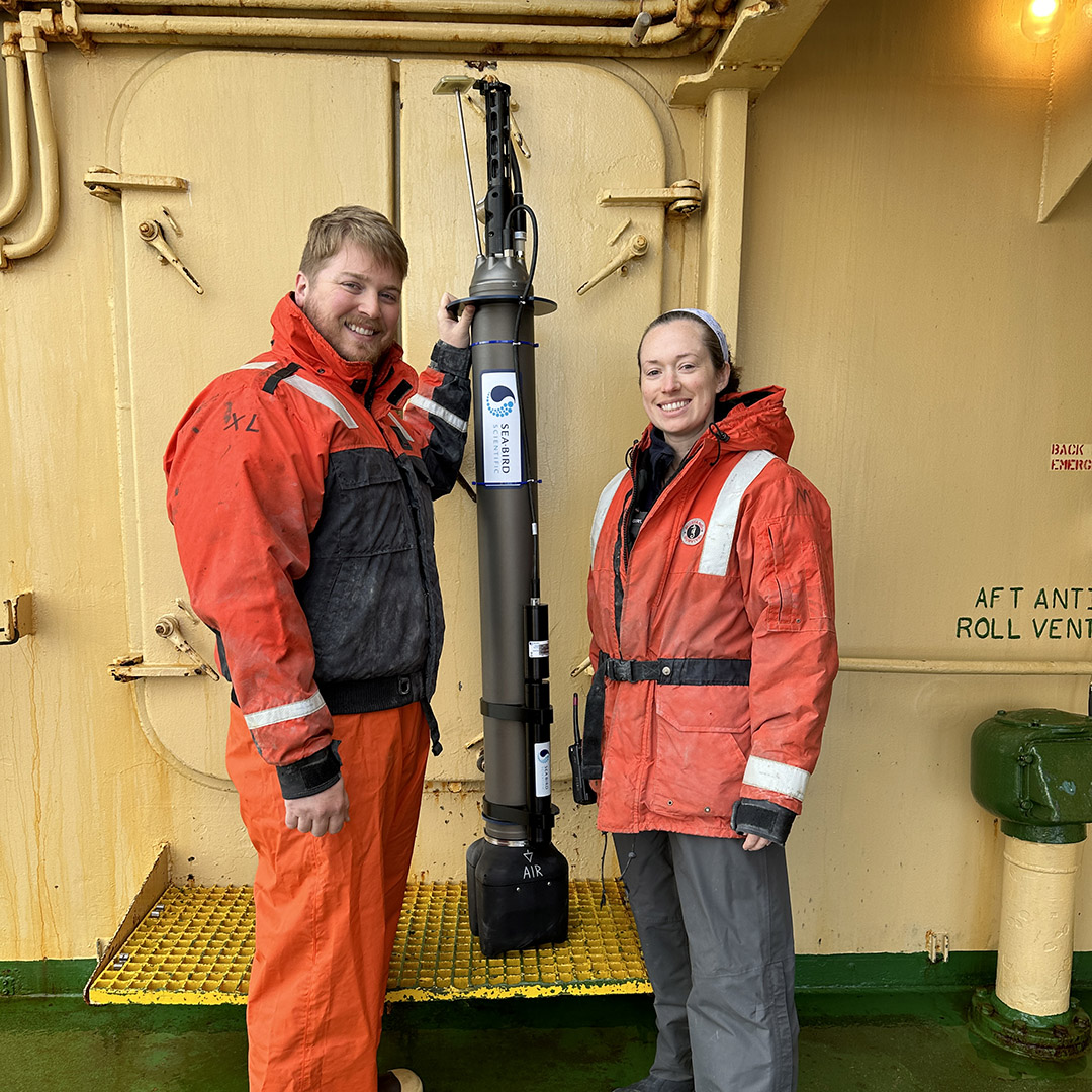 Eric and Angela, the two SOCCOM technicians sailing aboard NBP24-04, preparing to deploy Navis GO-GBC float