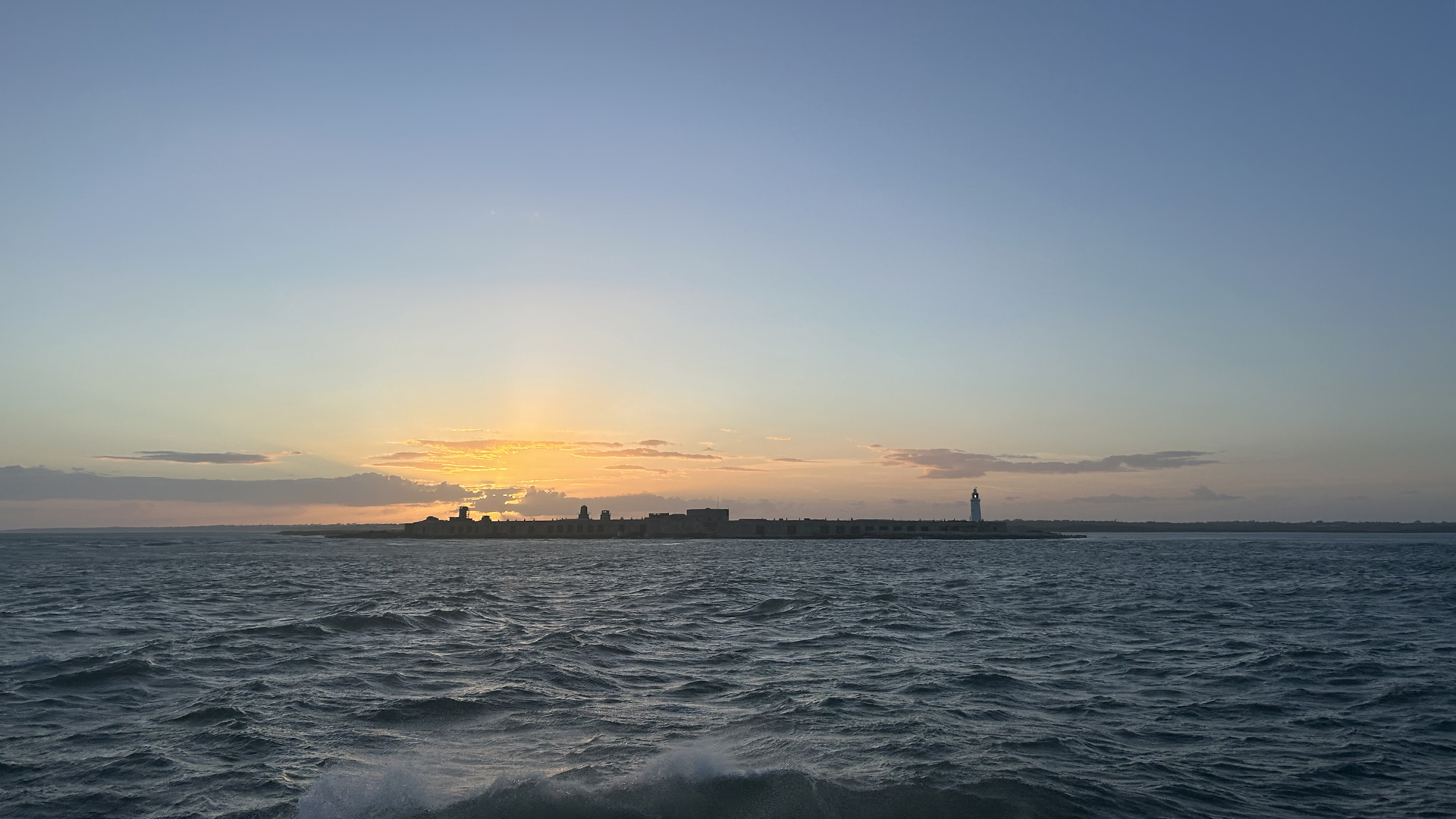 Sailing Past Hurst Castle With A Cooperative Sunset Sailing past Hurst Castle with a cooperative sunset