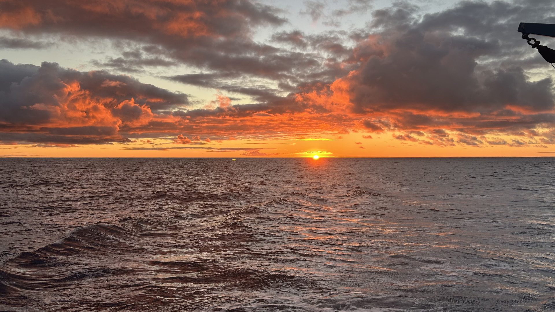 6.17 Sunrise 16x9 The timing of the CTD cast before sunrise means once the rosette is back on deck and the floats deployed, the sun is just starting to poke above the horizon.