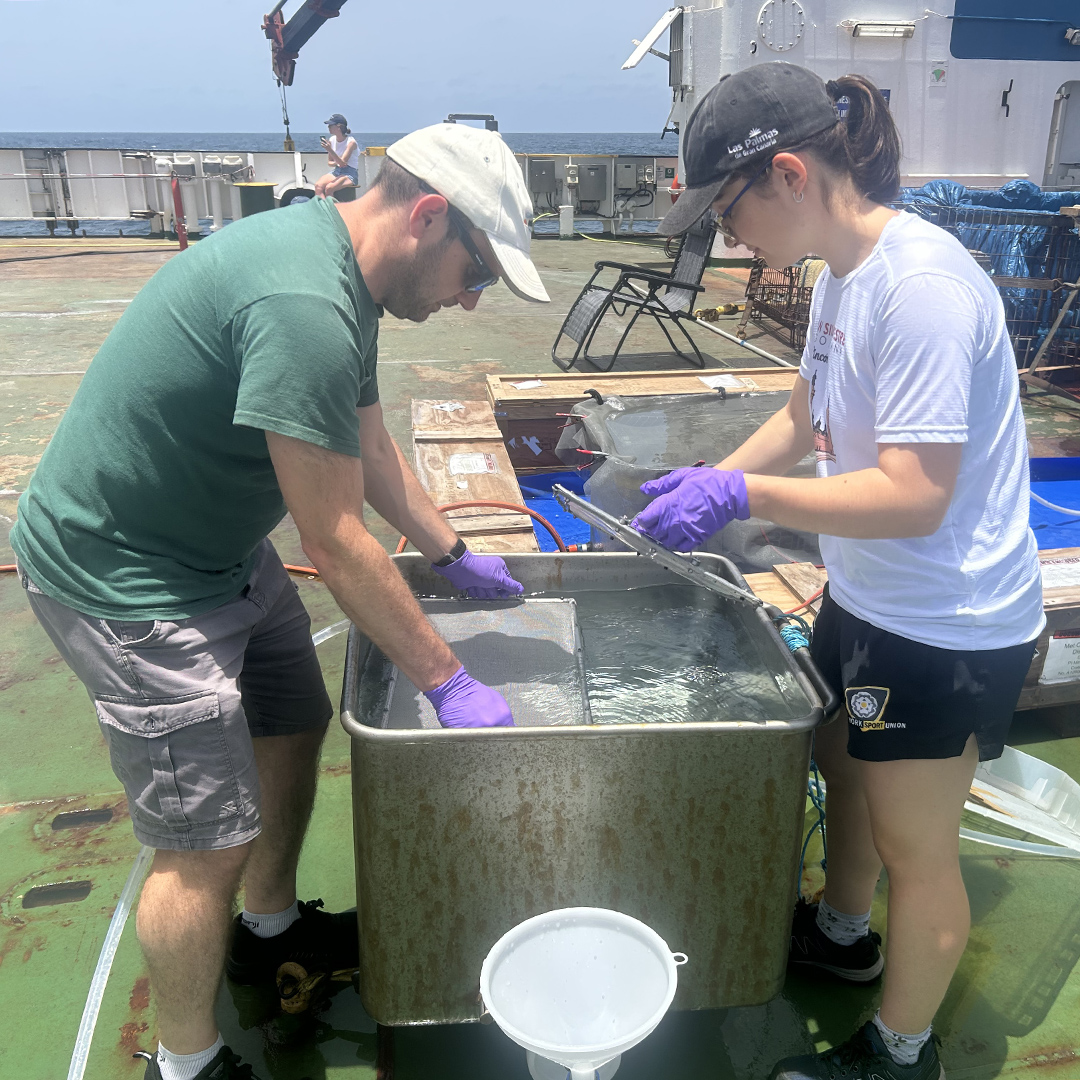 6.24 SML Tank Sq Dr. Thomas Bell and PhD student Irene Monreal-Campos from Plymouth Marine Laboratory (PML) here are taking SML samples using a tank on the deck of the ship, a novel method being tested.