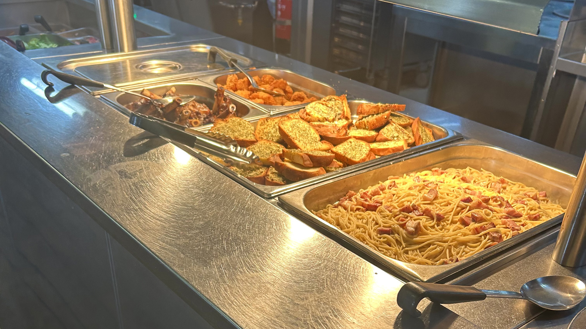 6.28 Dining 16x9 Meals are served buffet-style for breakfast, lunch, and dinner.