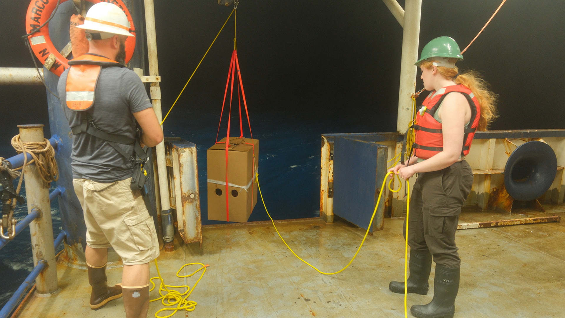 Lowering A Deep Float A core float begins its journey at night as the ship leaves station. This one was deployed by Zoe Fricker and Andrew Marshall Fagerheim.
